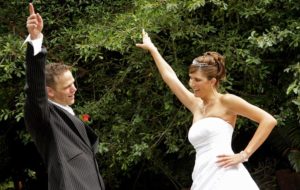 Image of Bride and Groom dance at their reception.