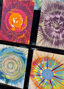 Image of spin art cards with colorful paint splatters.